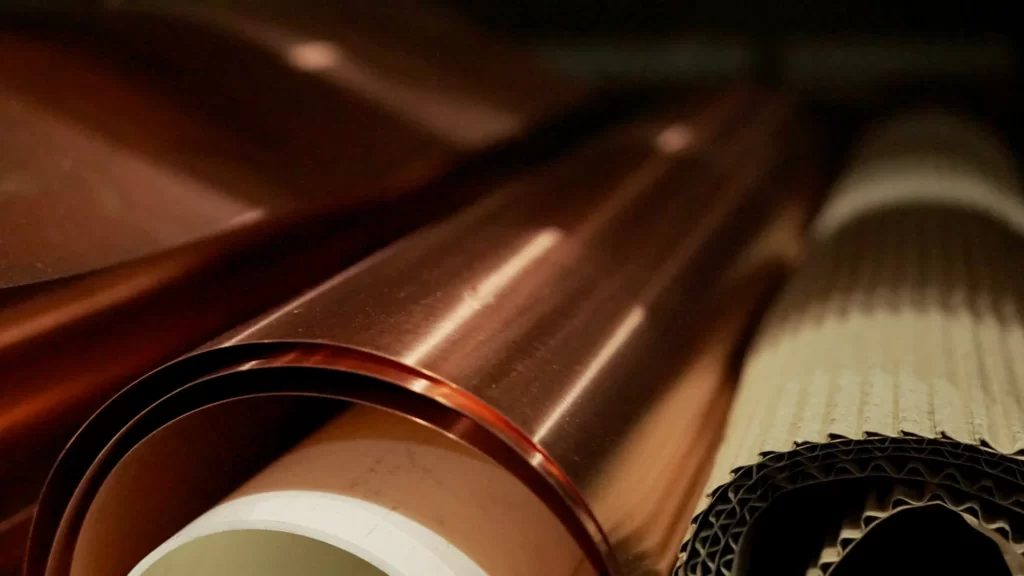 Close-up of copper shim stock rolls