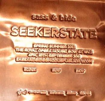 Sass & Bide Spring Summer 2012 fashion invitation embossed in copper shim